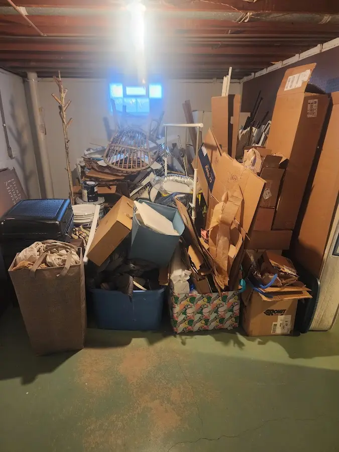 Roll-off dumpster container at job site for 2 Yard Dumpster Rental in Thousand Palms